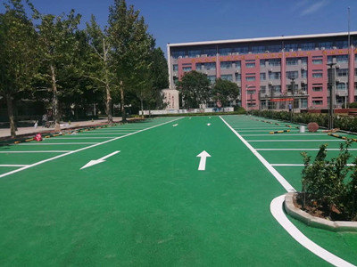 偉博施工育才學(xué)校通州分校地面瀝青改色工程